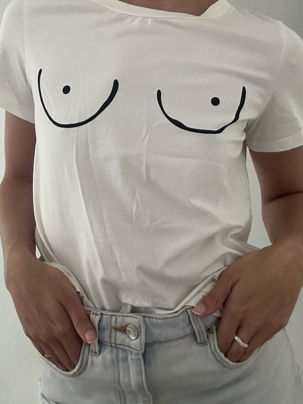 White Graphic Tee with Minimal Black Line Art